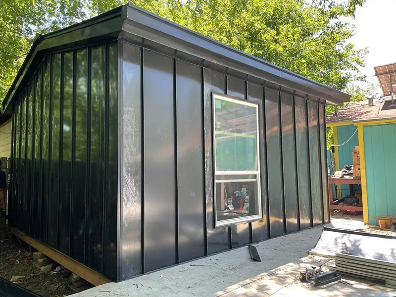 Black standing seam metal wall panels for Roof Inspection in Leavenworth